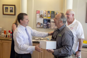 Jim McLean of Edward Jones giving away a door prize at his networking event.